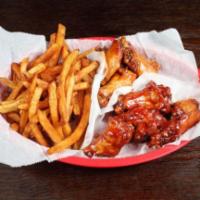 10 Piece Buffalo Wings Combo · With fries and 20 oz. cup drink.