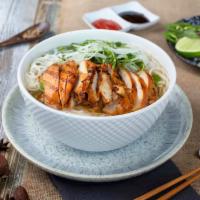 Grilled Chicken Pho · Dark meat of a grilled fiery chicken. Served in our 12-hour bone broth.