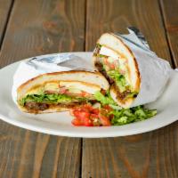 Grilled Fish Torta · Torta with tomato, avocado, smashed beans, cheese, mayo and lettuce.