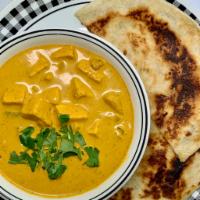 Paneer Tikka Masala · Buttermilk marinated paneer in a thick gravy of onions, tomatoes and Indian spices with a si...