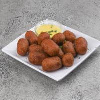 Corn Dogs · Served with honey mustard.