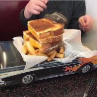 Lucky's Kids Grilled Cheese Sandwich · Choice of Cheddar, American or Swiss cheese.