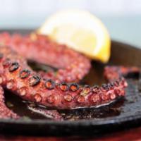 Wood Fired Octopus · Fresh Octopus cooked off in the pizza oven with balsamic vinaigrette (GF)