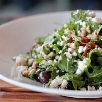 Farro Salad · Arugula, farro, ricotta salata, olives, raisins, pinenuts, goat cheese and lemon vinaigrette