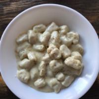 Truffle Gnocchi · Housemade gnocchi in a truffle, leek and cream sauce