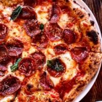 Soppressata Picante Pizza · Spicy soppressata, garlic and basil
