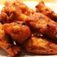 Buffalo Chicken Wings · Glazed in a delectable buffalo hot sauce, served with your choice of ranch of bleu cheese dr...