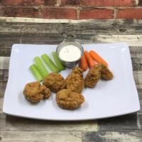 Boneless Wings · Breaded Fried Boneless Wings Meat. Served with Carrots, Celery Sticks, Ranch or Blue Cheese.