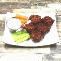 Boneless BBQ Wings · Breaded Fried Boneless Wings Meat. Glazed With BBQ Sauce, Served with Carrots, Celery Sticks...