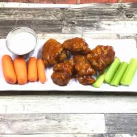 Boneless Sweet Chili WIngs · Breaded Fried Boneless Wings Meat. Glazed With Sweet Chili Sauce, Served with Carrots, Celer...
