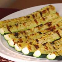 Grilled Zucchini Wedges · Seasoned, charbroil grilled shrimp on skewers, toped with fresh cilantro. Served with slice ...
