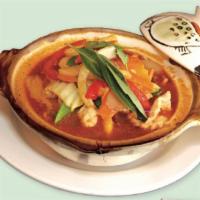 Red Curry Dinner · For those who love curry, contains your choice of meat with vegetables and basil in Thai red...