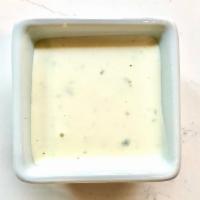 Green Onion Sour Cream · Mild sour cream, mayo, green onions, cayenne sauce.
