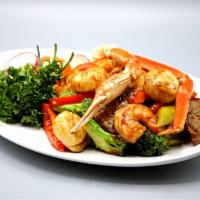 Thai Basil Seafood · Jumbo shrimp, scallop with broccoli, onion, sweet bell pepper in Thai basil sauce. Hot and s...