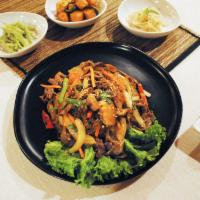 Japchae 잡채 · Glass noodles with stir fried carrots, onions, red peppers, green onions and marinated beef.