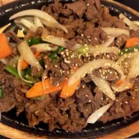 Beef Bulgogi 소불고기 · Marinated shredded ribeye with assorted vegetables.