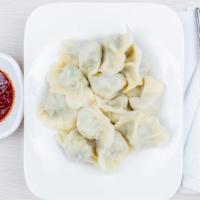 7. Samsun Boiled Dumplings · 12 pieces. Contains shrimp, pork, eggs, cabbage and chives