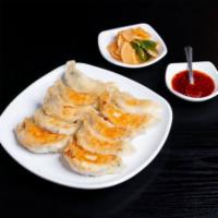 8. Pan Fried Dumplings · 10 pieces. Contains shrimp, pork, eggs, cabbage and chives