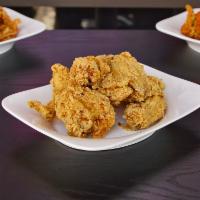 19. Soy Garlic Fried Chicken · Our soy garlic sauce is made in house and brewed for several days to give the sauce a deep f...