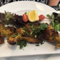 Ginger Chicken Kebab · Chicken marinated in ginger and spices grilled in a clay oven.