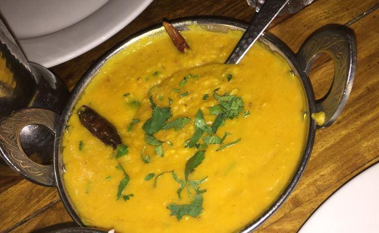 Dal Tadka · Yellow lentils tempered with cumin, ginger and cilantro.