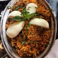 Lamb Biryani · Succulent lamb, slow-simmered with basmati rice and whole spices.