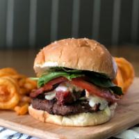 Bleu Burger · 8 oz. hamburger, bleu cheese spread, baby spinach, bacon and tomato jam.