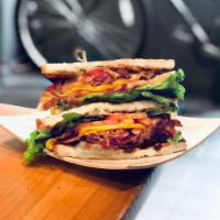 Monster BLT Sandwich · Thick-cut bacon, avocado, smoked cheddar, lettuce, tomato and Kewpie mayo on thick-cut white...