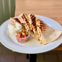 Quesadilla · Classic Mexican and Tex Mex cheese quesadilla! Toasted flour tortilla with melted cheese ins...