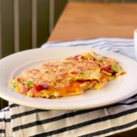 Western Omelette · Ham, tomato, peppers, onion and cheddar.