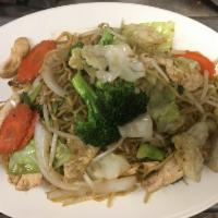 97. Chow Mein · Pan fried egg noodles with meat and vegetables. Includes choice of either chicken, pork, tof...