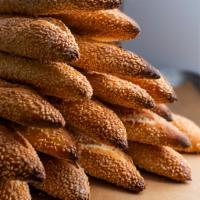 Jerusalem Baguette · Slow-fermented mini sourdough baguette rolled in sesame seeds.