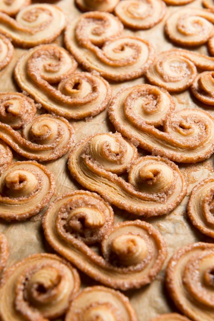 Palmiers · Cinnamon sugar-filled puff pastry cookies.