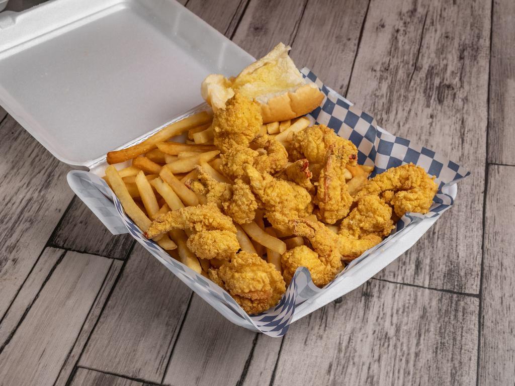 Freshly Battered Fried Jumbo Shrimp · 12 pieces. Served with French fries and garlic bread.