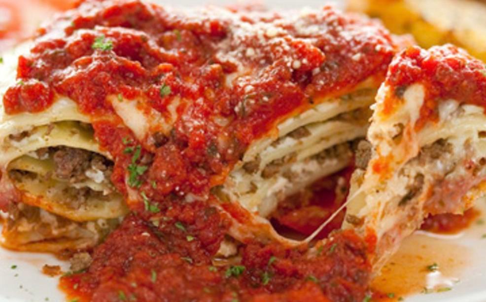 Cheese Lasagna with Meat Sauce · Lasagna topped with classic cheese, tomato sauce, and ground beef sauce.