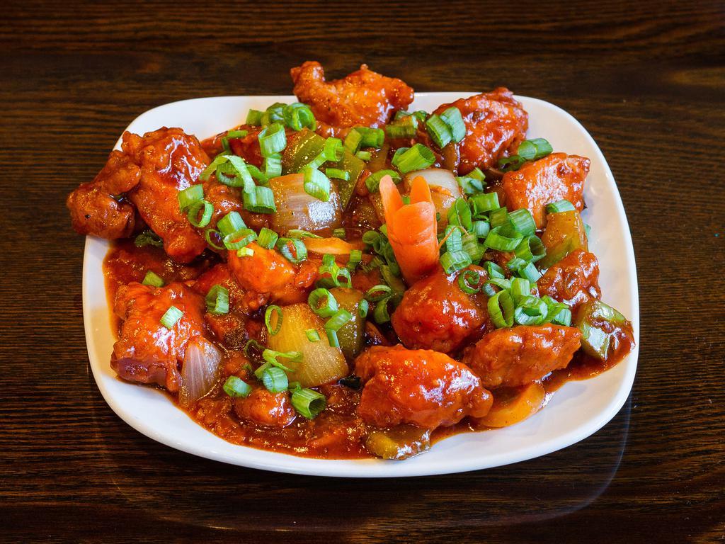 Chilli Chicken  · Fried boneless chicken with bell pepper, onion and chilli sauce.