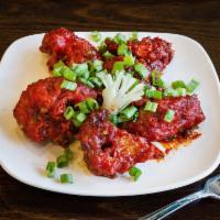 Gobi Manchurian  · Deep fried cauliflower cooked in Manchurian sauce.