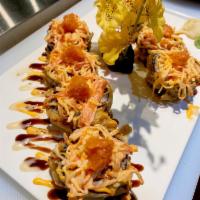 Volcano Roll · Cajun roll, spicy tuna, crab meat on the top.
