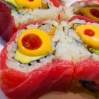 Sweet Heart Roll · Spicy tuna, salmon, white fish, avocado inside, fresh tuna on the top.