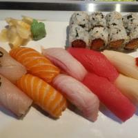 Sushi Deluxe · 10 pieces assorted raw fish and California roll.