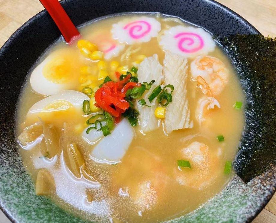 Seafood Ramen · Miso. Shrimp, squid, egg, fish cake, bamboo shoot, scallops, nori.