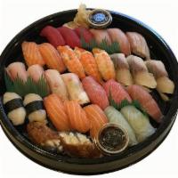 REGULAR SUSHI ASSORTMENT 並にぎり寿司２５貫盛合せ · (25 PCS REGULAR NIGIRI SUSHI) Tuna, White Fish, Salmon, Boston Mackerel, Eel, etc.