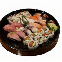 UME SUSHI 梅寿司 2 PERS · 2 Ume Sushi in one round Container 
(14 PCS NIGIRI SUSHI AND 16 PCS ROLL)