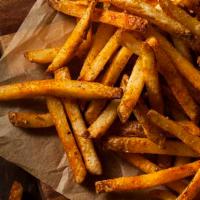 Ebullition Fries · Thin cut fries tossed in our signature seasoning rub & house made ketchup