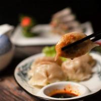 16. Shanghai Dumpling · 8 pieces. Pan fry or stemed. Choice of meat.