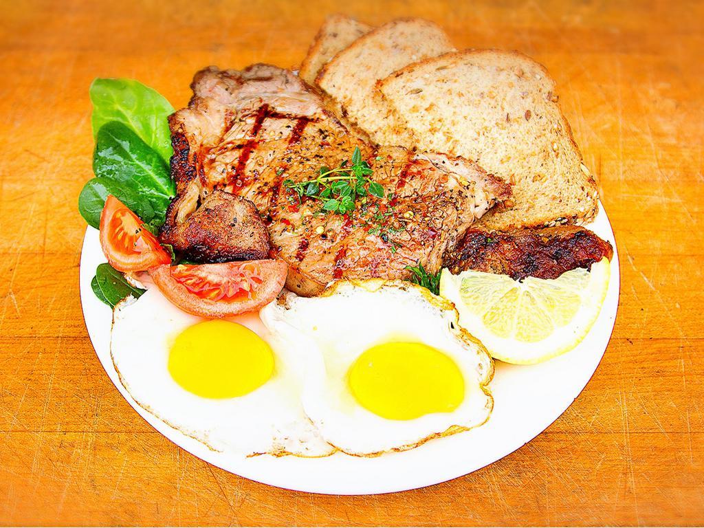 Angus new York steak and eggs · Angus choice new York 14 oz... mesquite and cooked to your choice of rare, med rare, med, medium well or well... served with 2 eggs, any style, toasts of your choice and hashbrownmore tater tots