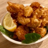 Popcorn shrimps · Served with rice and organic salad
