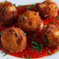 Arancini · house made portobello risotto, stuffed with feta and a bit of hot cherry pepper then fried g...