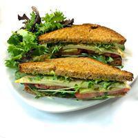 Green Goddess Sandwich  · Avocado mash, Muenster cheese, local sprout and shoot salad, tomato, arugula, green goddess ...
