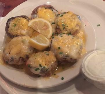 Stuffed Mushrooms · Extra-large mushrooms stuffed with crab and smothered in Swiss and cheddar cheese. Add horseradish sauce for an extra charge.